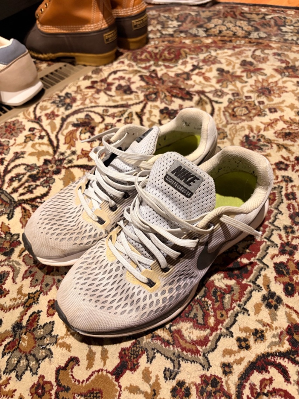 Nike Light Gray Running Shoe with Neon Lime Insole